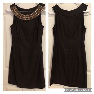 Cute brown dress with ornate beaded neckline